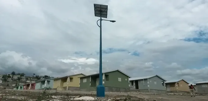 Solar streetlight over a neighborhood